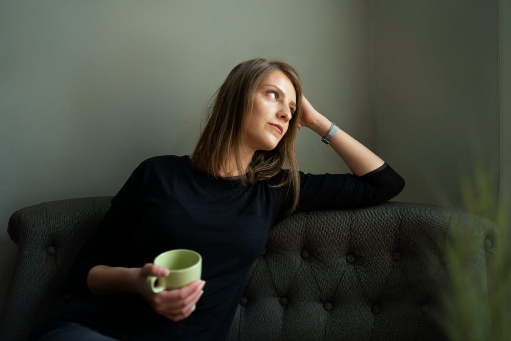 woman thinking about going to counselling